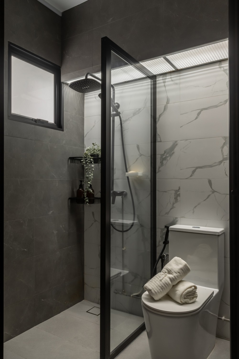 Minimalist Bathroom with Homogeneous Tiles and Bathroom Accessories