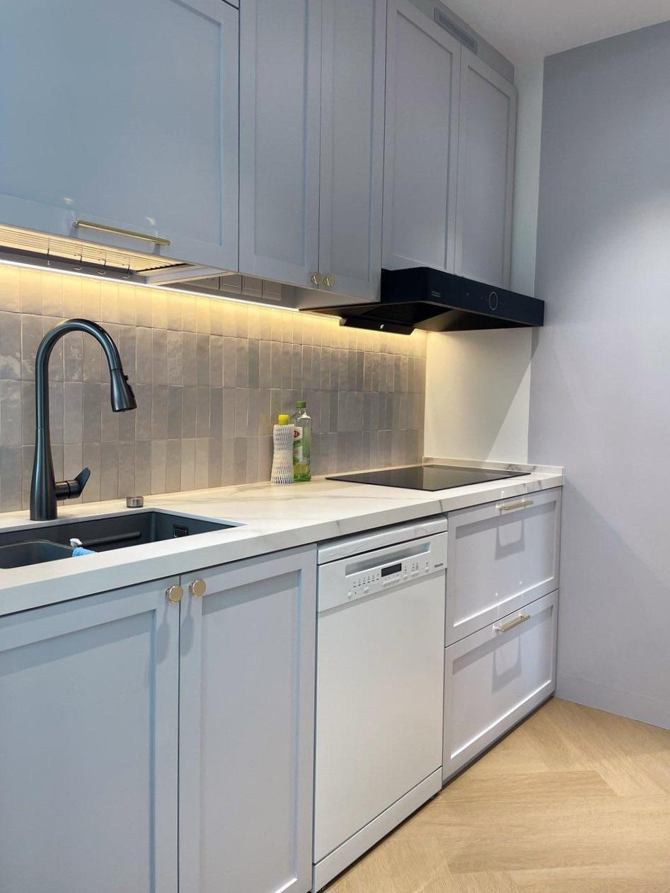 Modern Kitchen with Countertop and Kitchen Backsplash