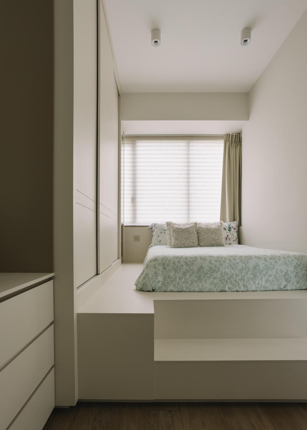 Scandinavian Bedroom with Platform Bed and Wood Flooring