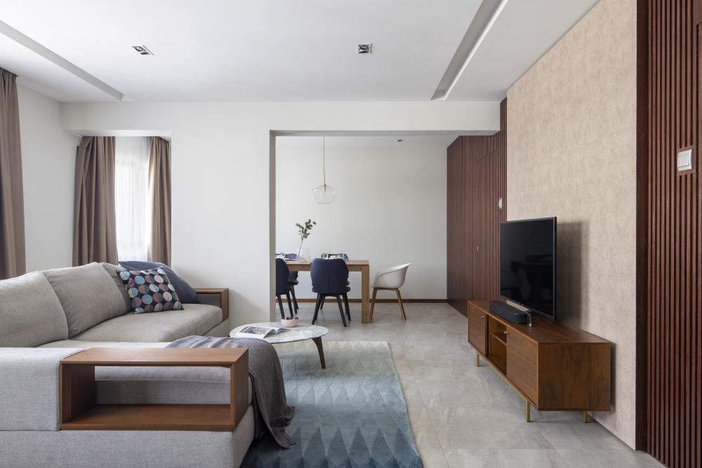 Scandinavian Living Room with Homogeneous Tiles and TV Console