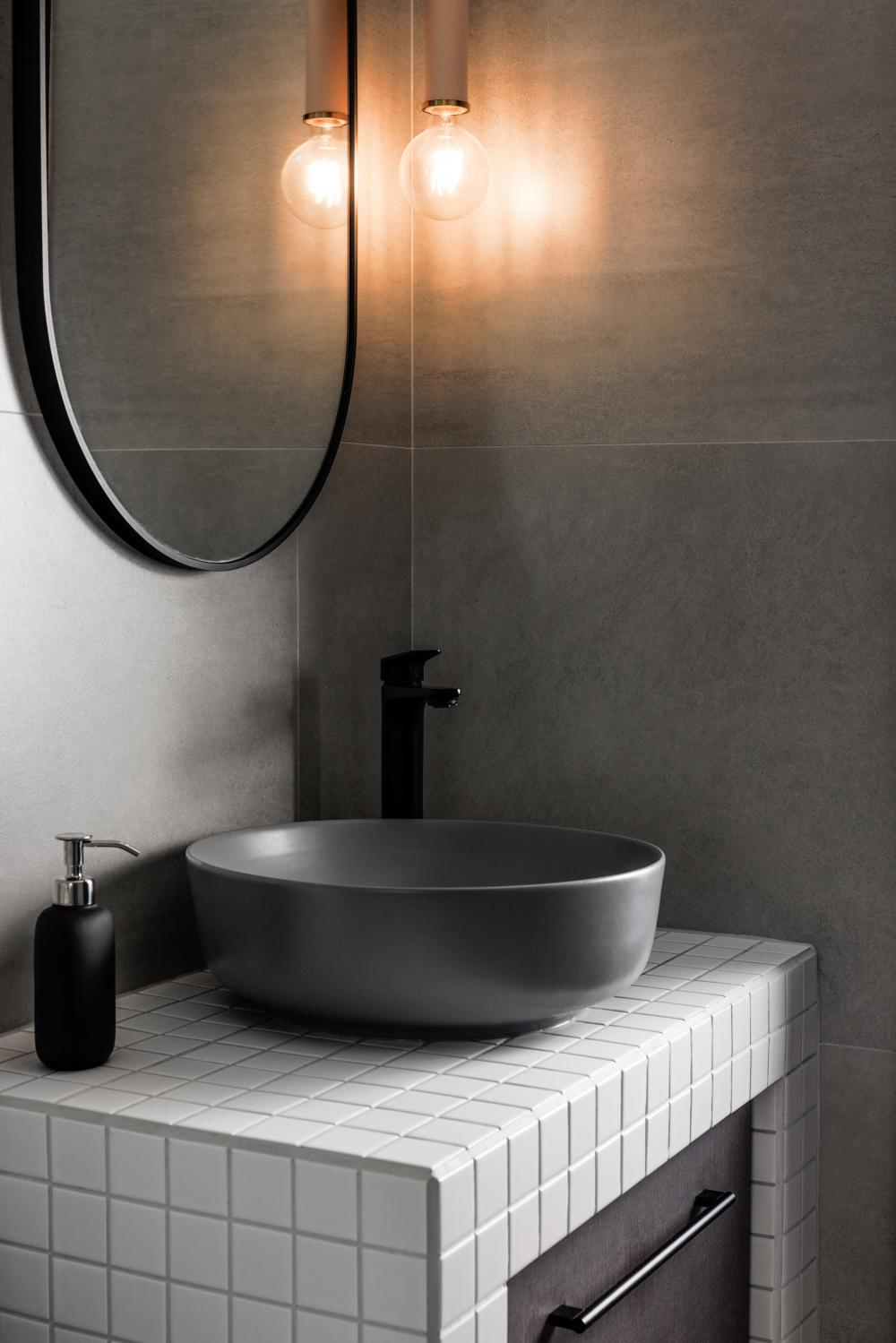 Scandinavian Bathroom with Countertop and Mirror