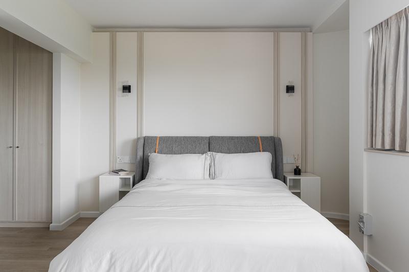 Contemporary Bedroom with Wood Flooring and Feature Wall