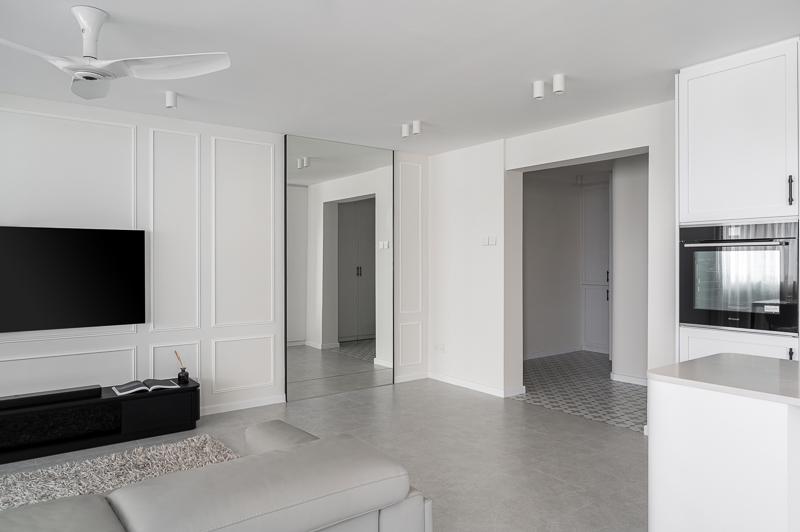 Contemporary Living Room with Homogeneous Tiles and TV Console