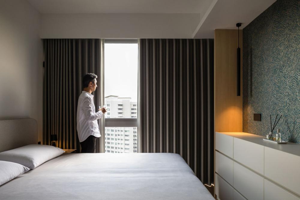 Minimalist Bedroom with Cove Lighting and Drop Ceiling