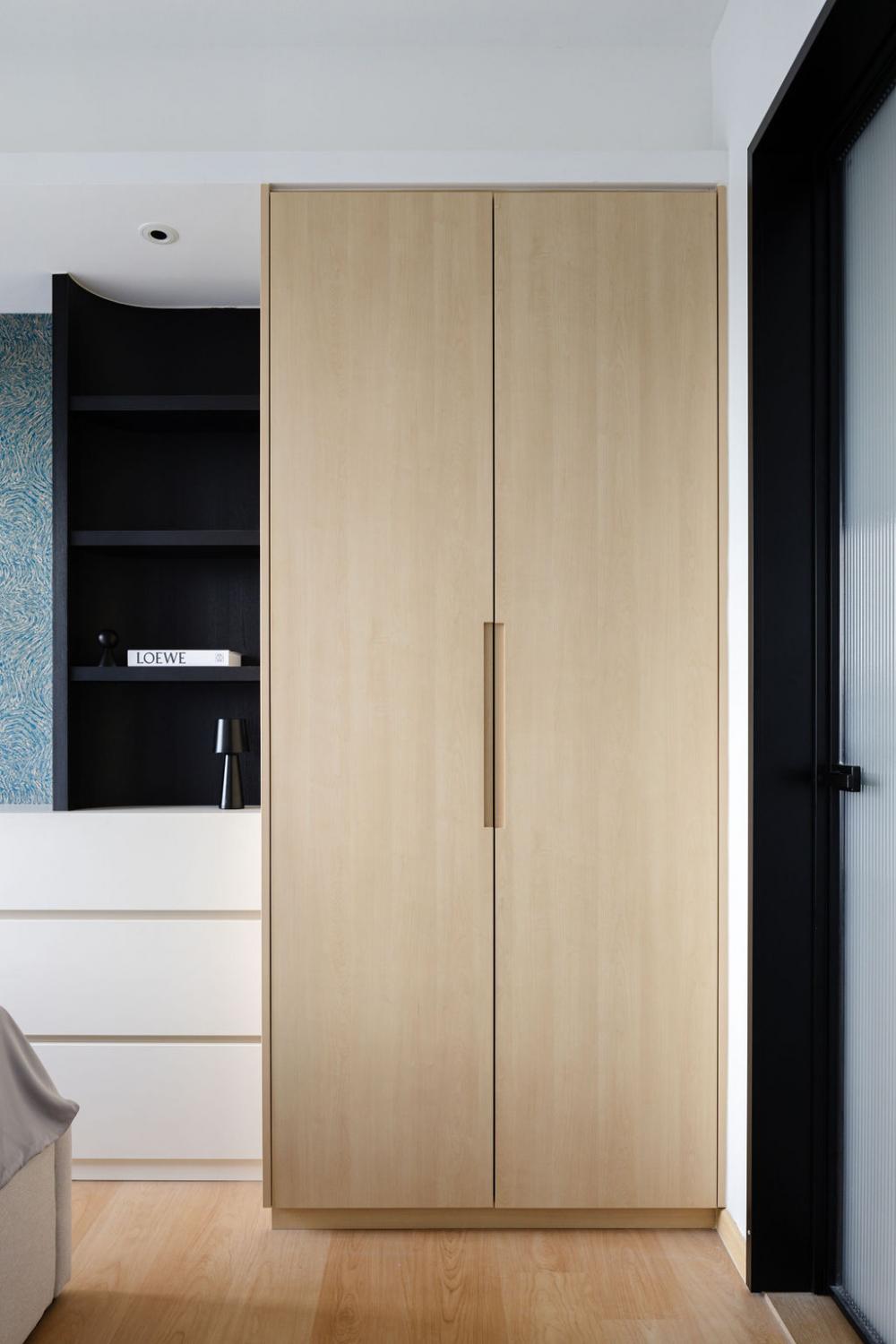 Minimalist Bedroom with Wood Flooring and Cove Lighting