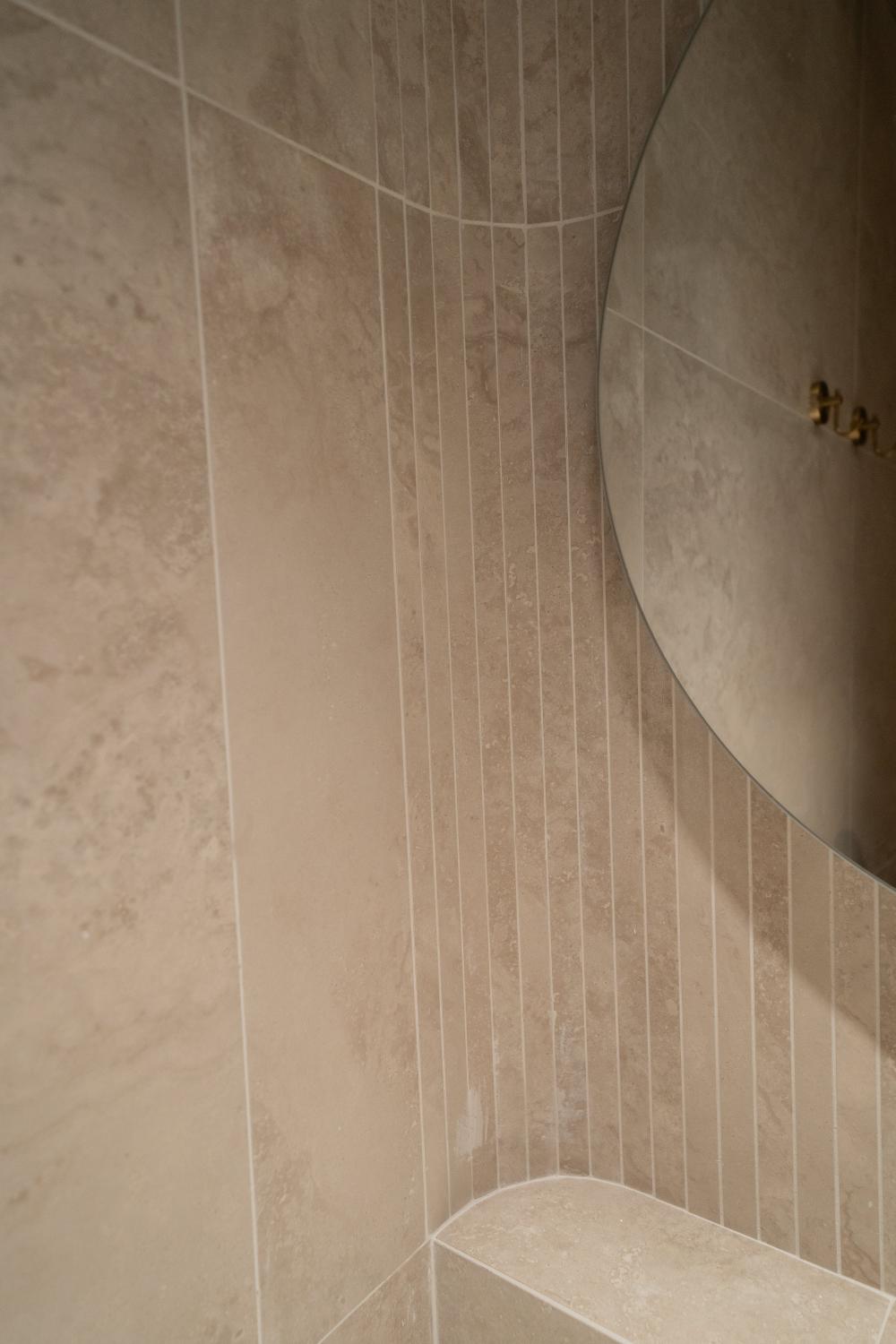 Minimalist Bathroom with Herringbone Tiling and Flooring