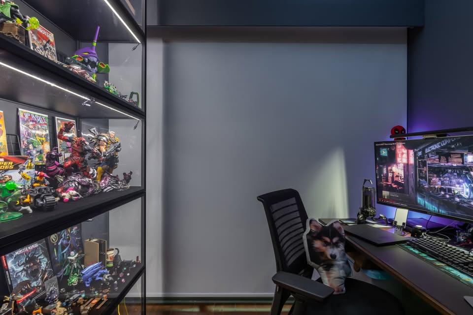 Modern Gaming Room with TV Console and Computer