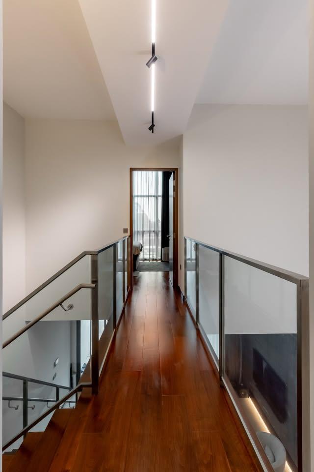 Modern Hallway with Artwork and Paintings