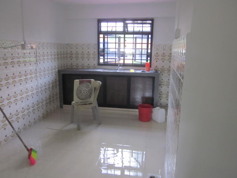 Asian Kitchen with Countertop and Vinyl Flooring