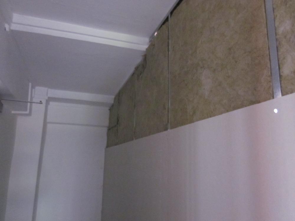 Asian Living Room with Feature Wall and Mirror