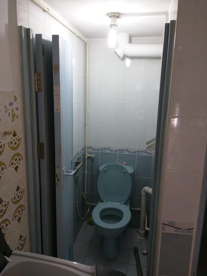 Asian Bathroom with Mirror and Bathroom Storage