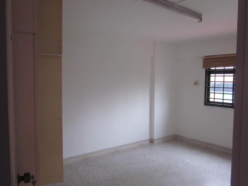 Asian Bedroom with Cement Floor and Bay Window