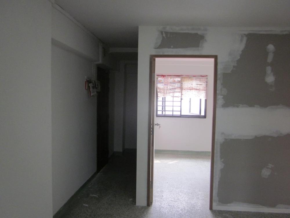 Asian Living Room with Bookshelf and TV Console