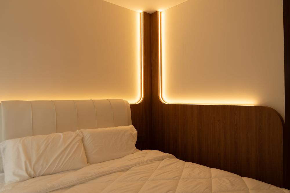 Scandinavian Bedroom with Cove Lighting and Bed