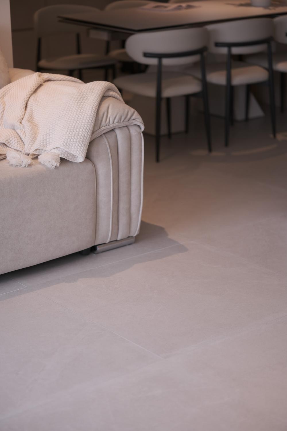 Modern Living Room with Cement Floor and Feature Wall