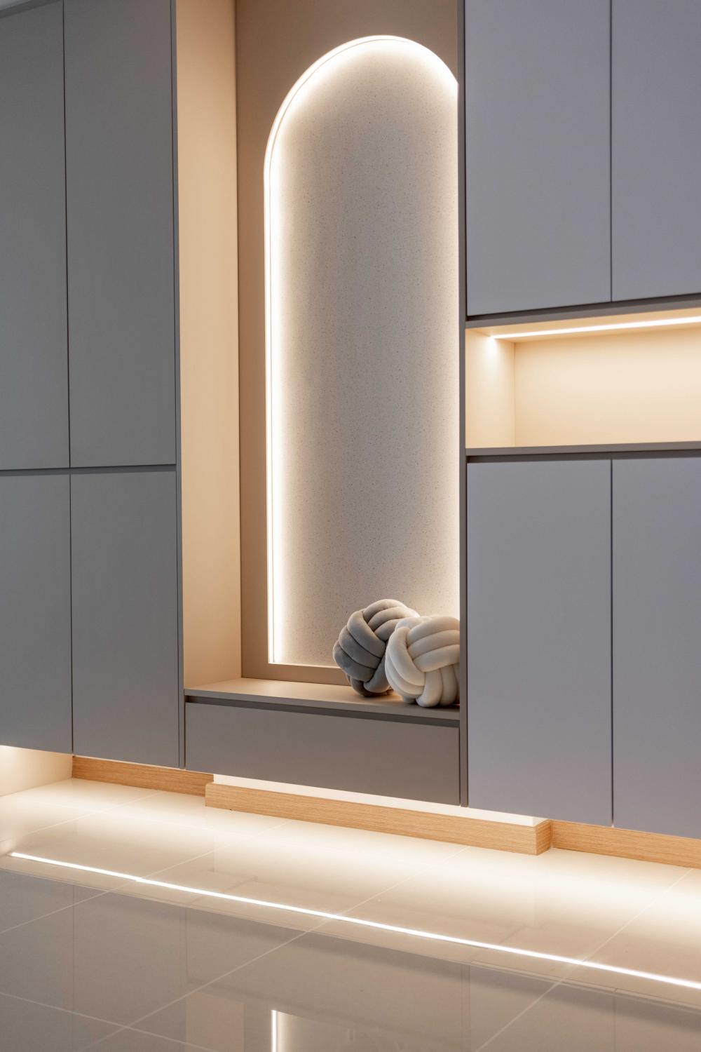 Minimalist Entryway with Shoe Cabinets and Lighting