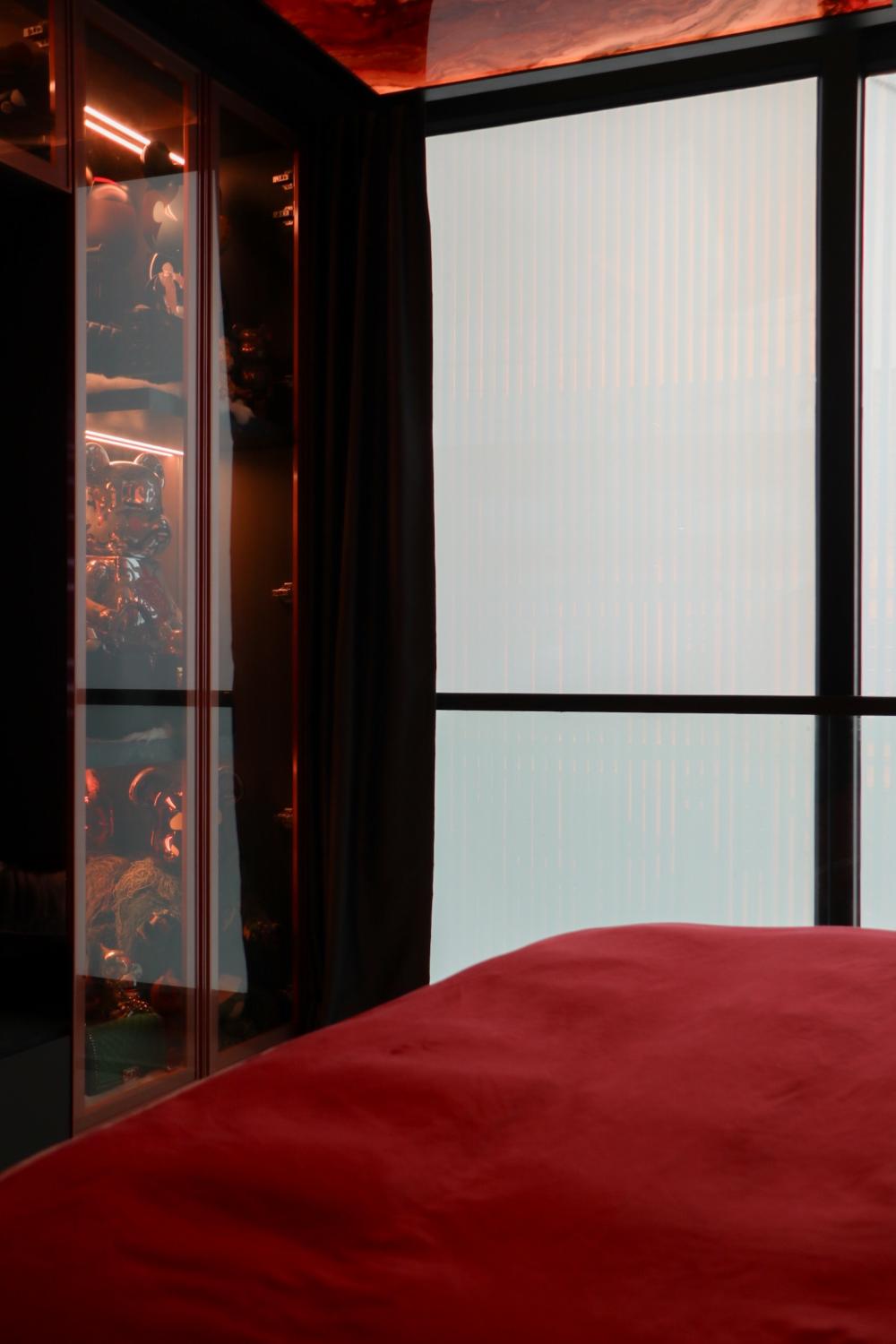 Modern Bedroom with Homogeneous Tiles and Cove Lighting