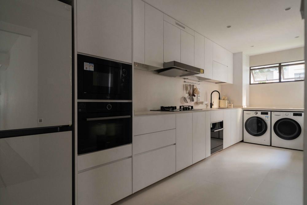 Minimalist Kitchen with Kitchen Window and Washing Machine