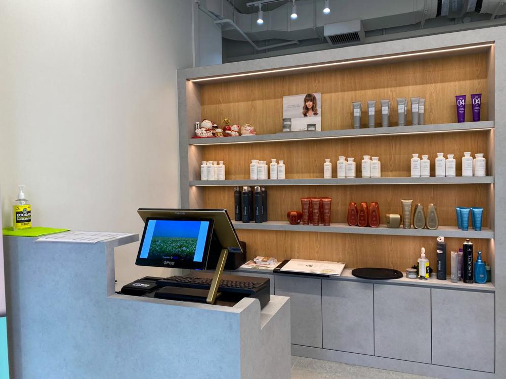 Minimalist Retail with Ceiling Light and Storage Cabinets