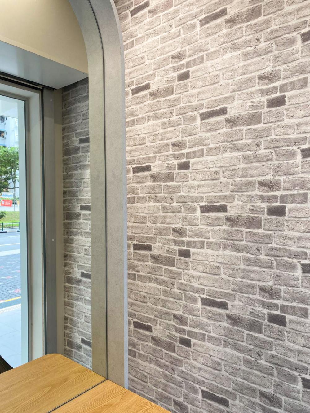 Minimalist Retail with Feature Wall and Wall Shelves