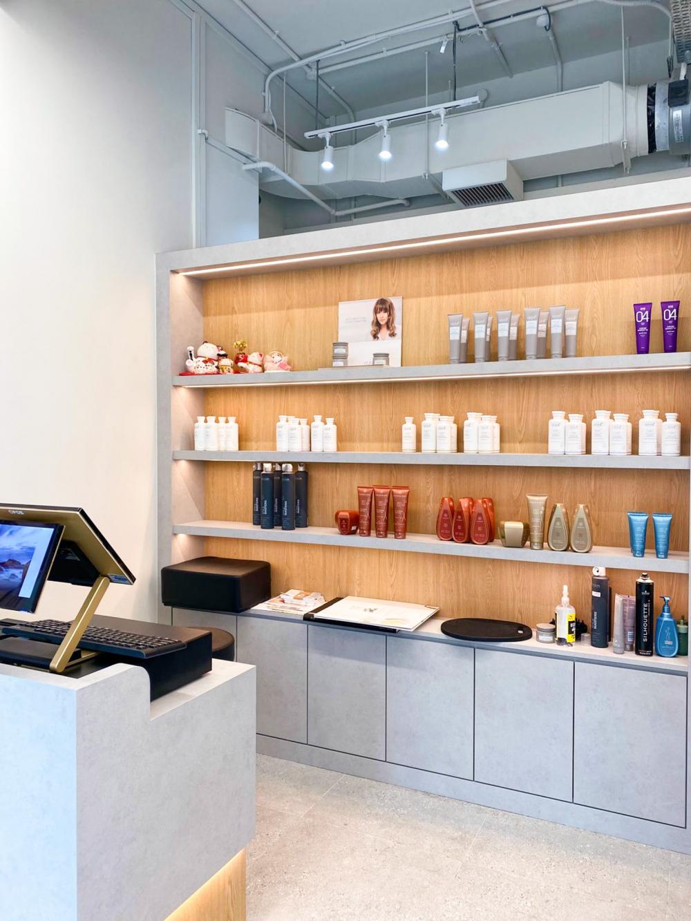 Minimalist Retail with Ceiling Light and Storage Cabinets