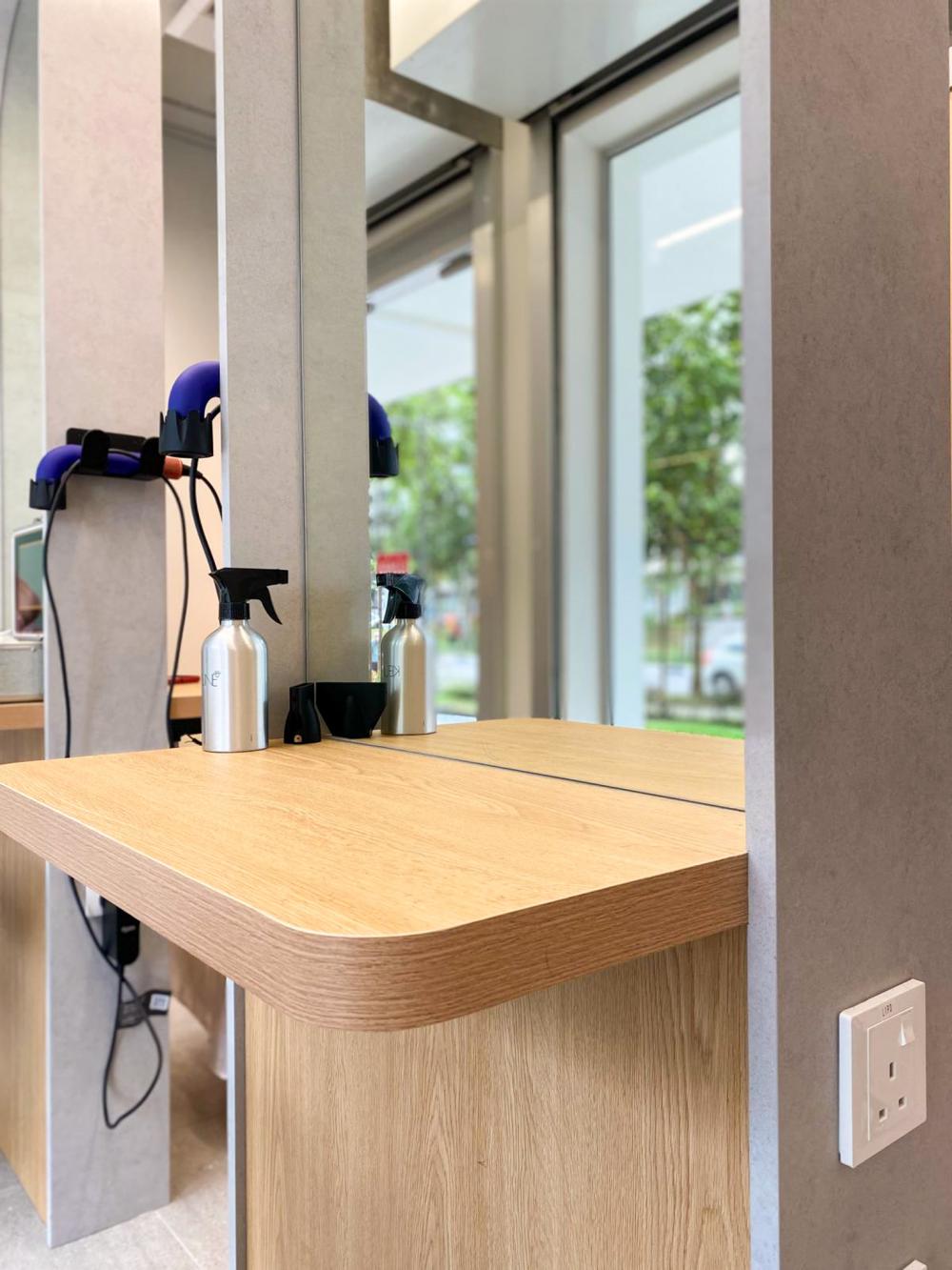 Minimalist Retail with Mirror and Shelving Units