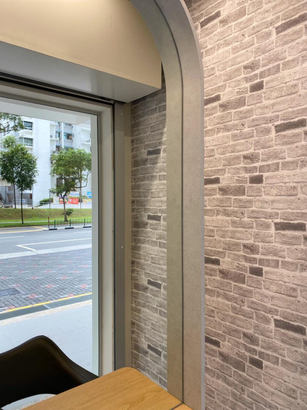 Minimalist Retail with Feature Wall and Mirror