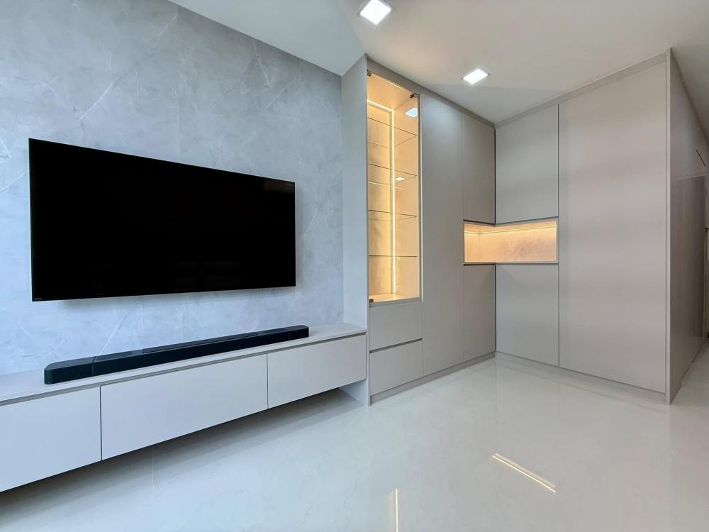 Minimalist Living Room with TV Console and Feature Wall