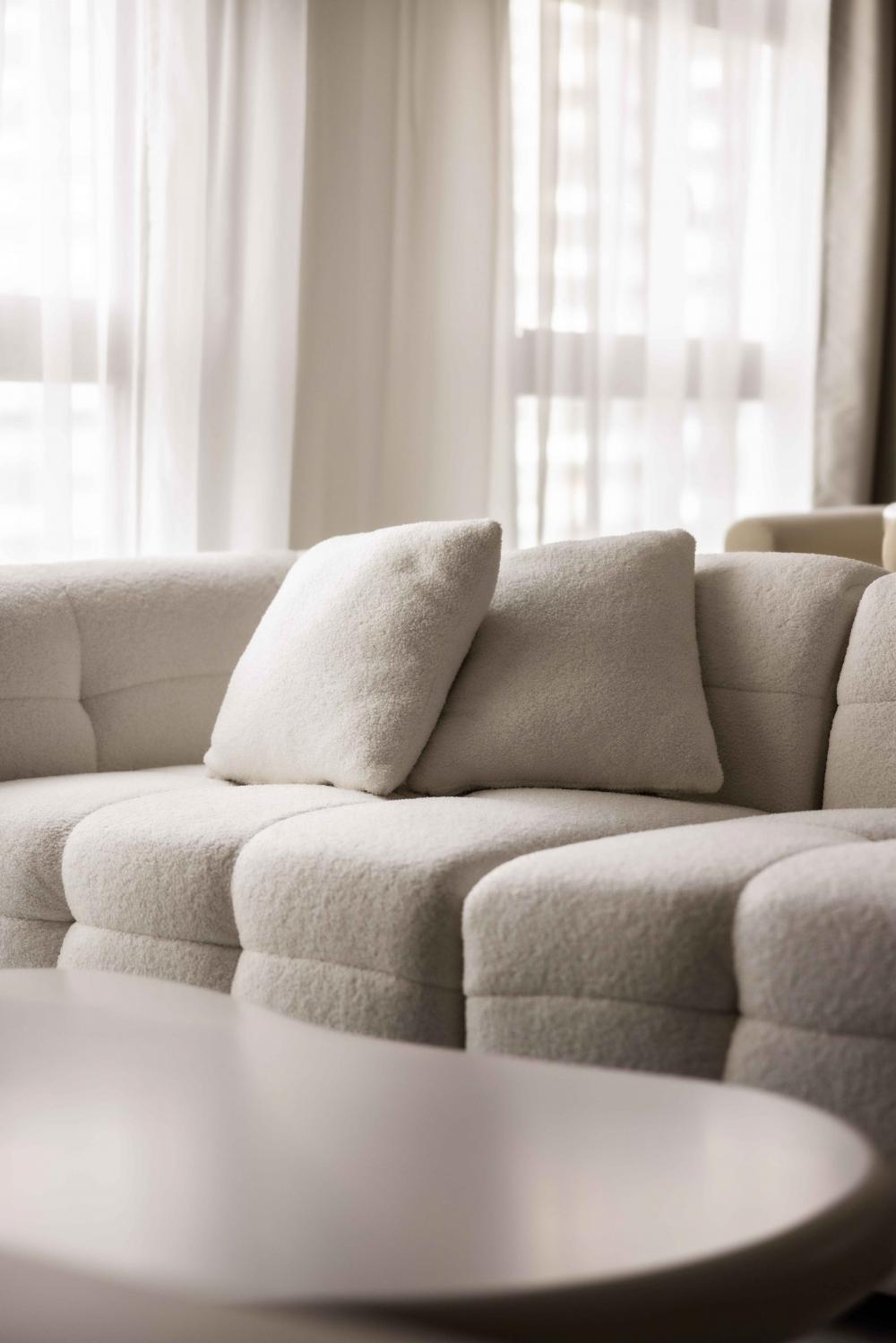 Contemporary Living Room with Homogeneous Tiles and Sofa