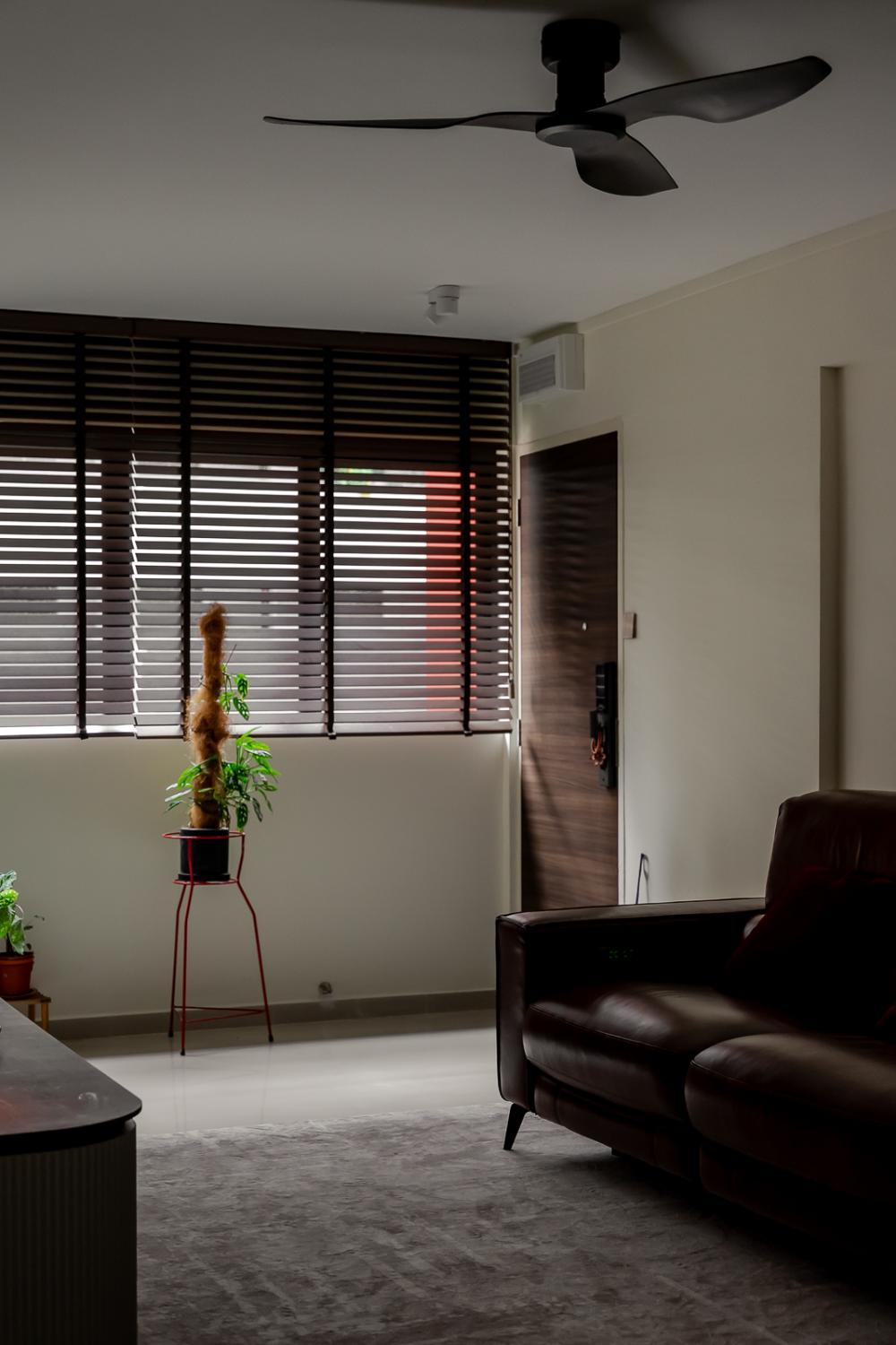 Modern Living Room with Homogeneous Tiles and TV Console