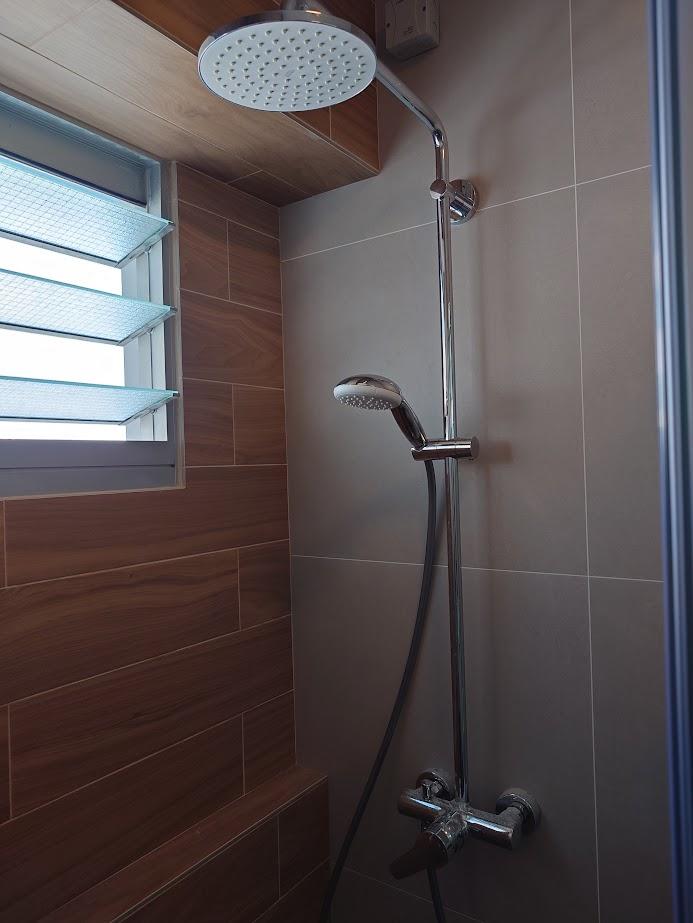 Scandinavian Bathroom with Bathtub and Shower Screen