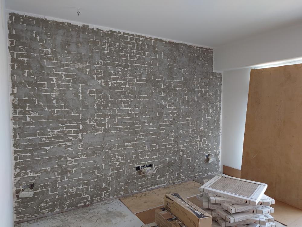 Scandinavian Living Room with Feature Wall and Drop Light