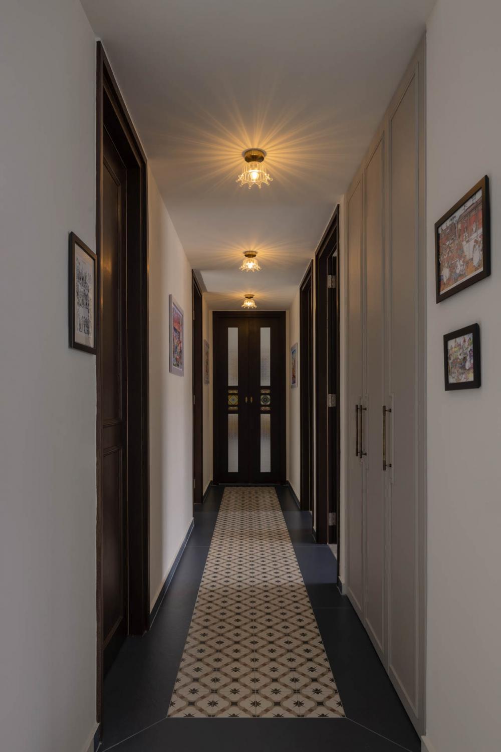 Eclectic Hallway with Artwork and Storage Cabinets