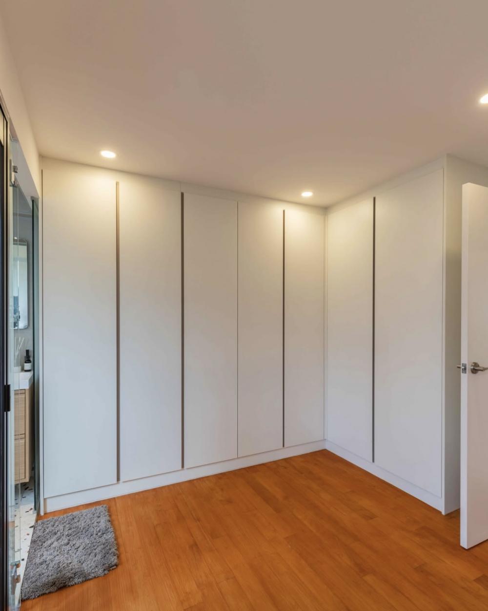 Modern Bedroom with Parquet Floor and Wardrobe