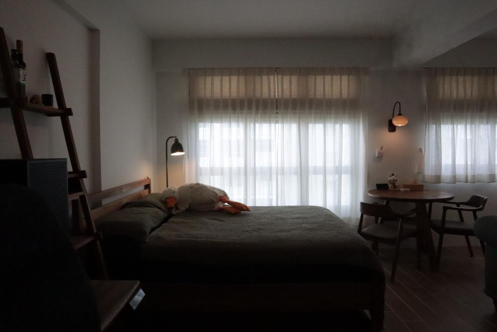 Country Bedroom with Homogeneous Tiles and Curtain