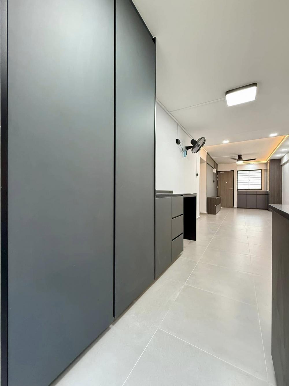 Modern Kitchen with Homogeneous Tiles and Cupboard