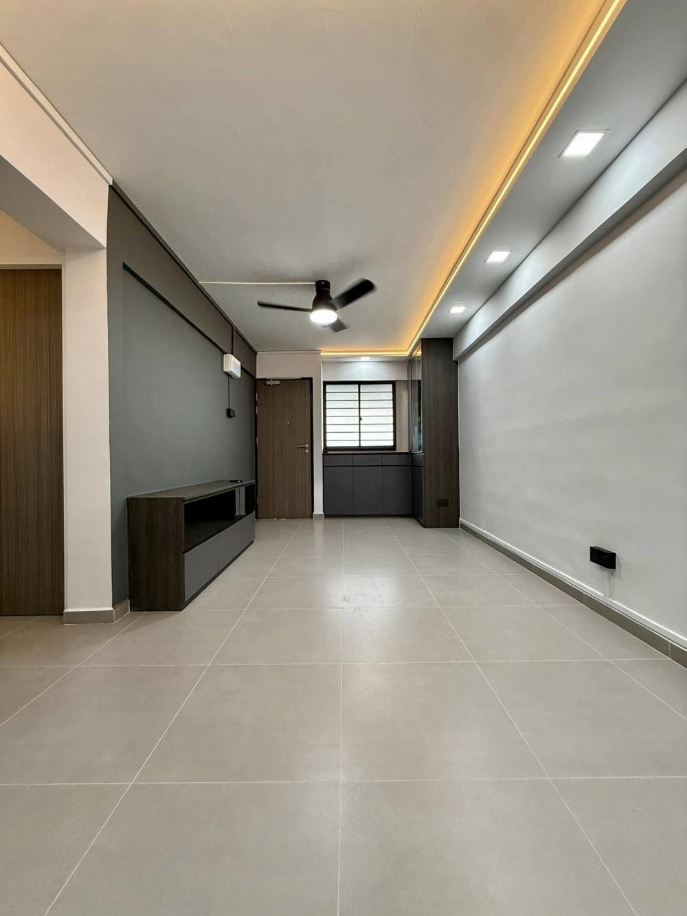 Modern Living Room with Homogeneous Tiles and Cove Lighting