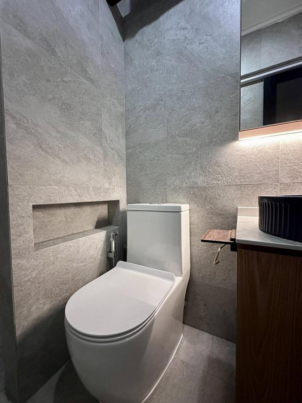 Scandinavian Bathroom with Homogeneous Tiles and Mirror