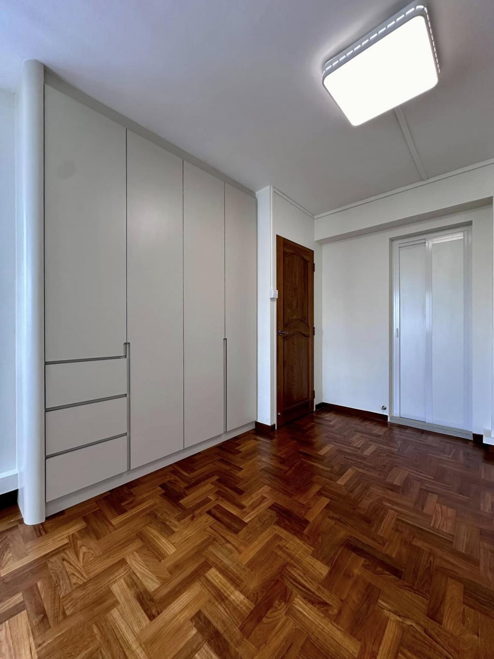 Scandinavian Bedroom with Parquet Floor and Ceiling Light