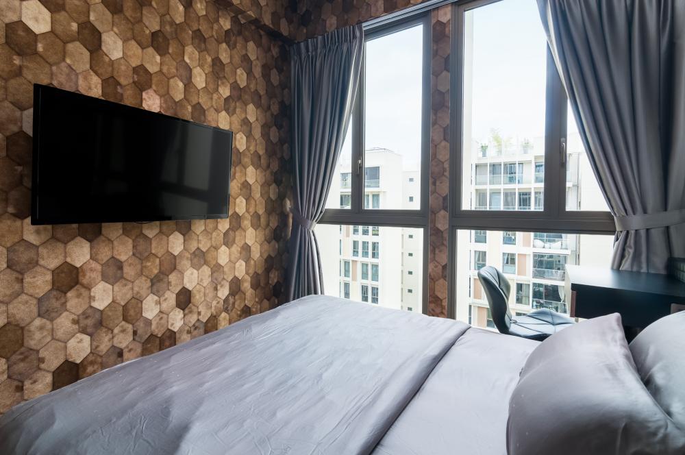 Contemporary Bedroom with Wallpaper and Queen Bed