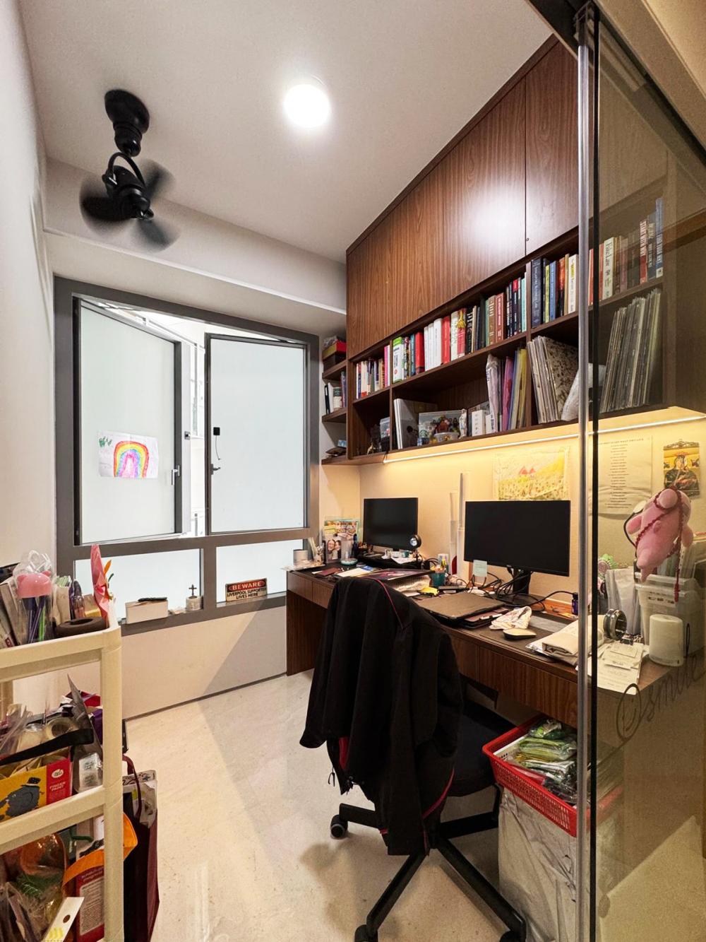 Minimalist Study with Bookshelf and Drop Light