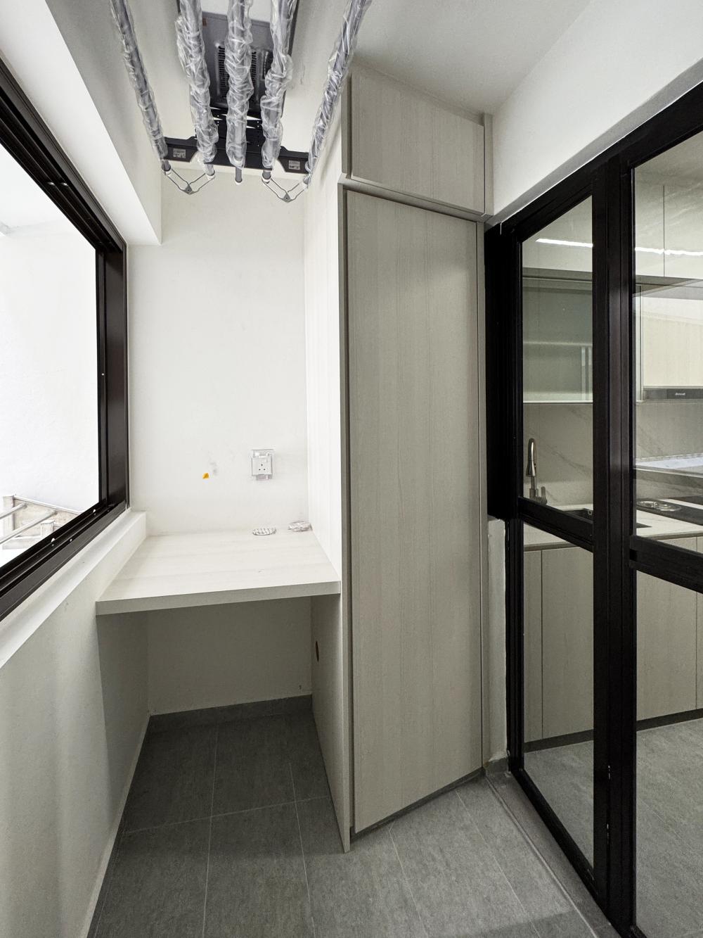 Minimalist Service Yard with Laundry Area and Drying Racks