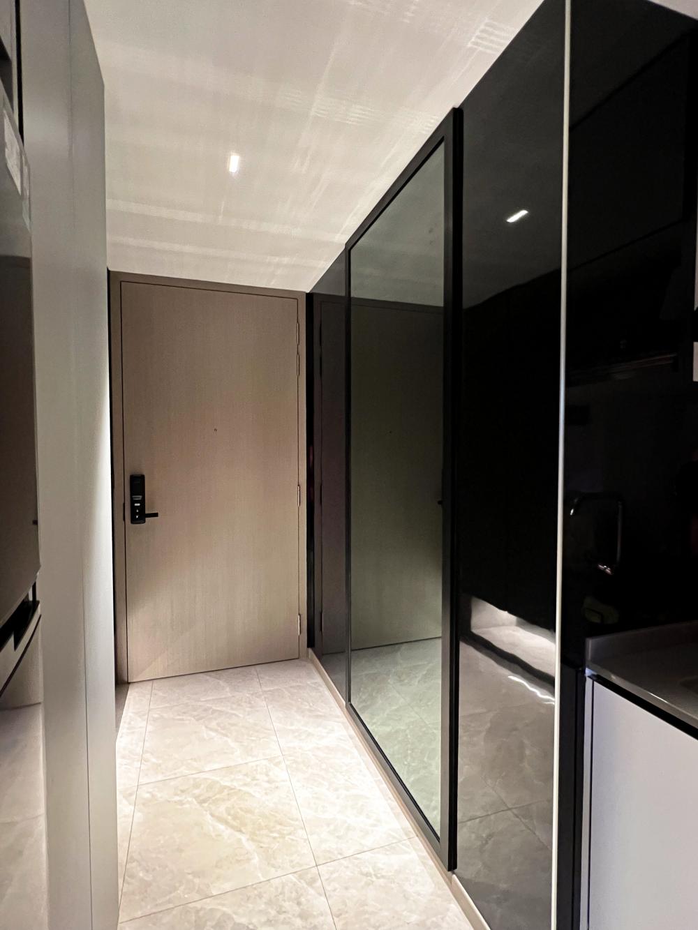 Modern Foyer with Feature Wall and Mirror