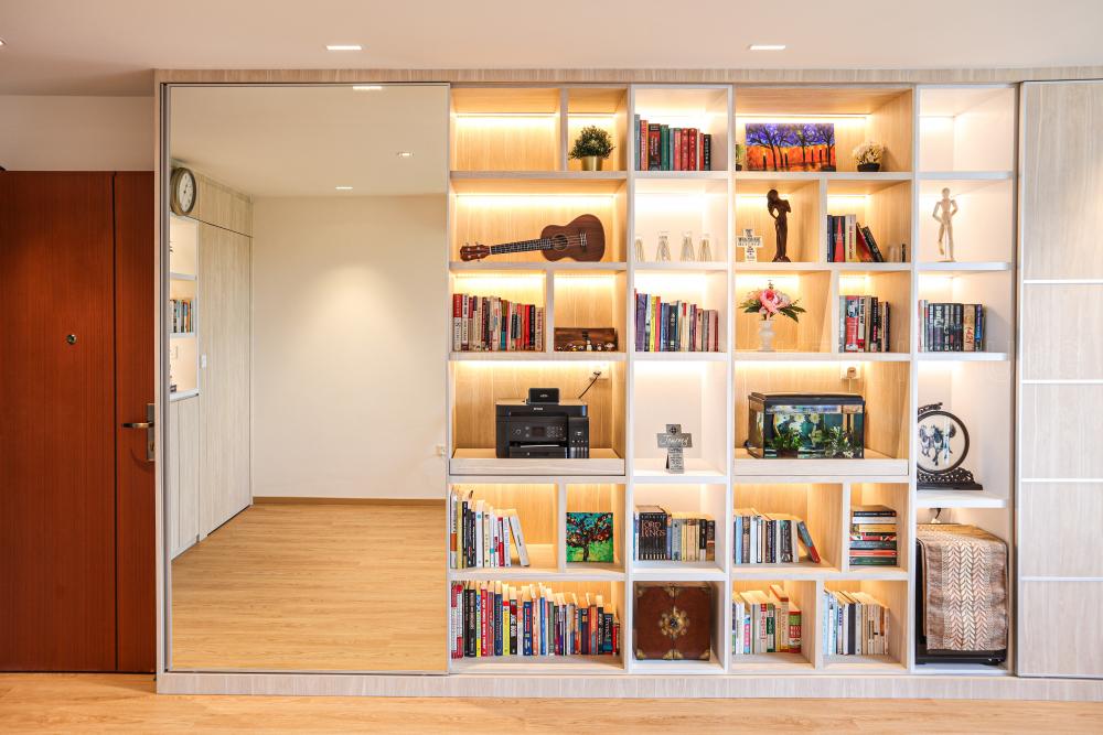 Scandinavian Living Room with Bookshelf and Wood Flooring