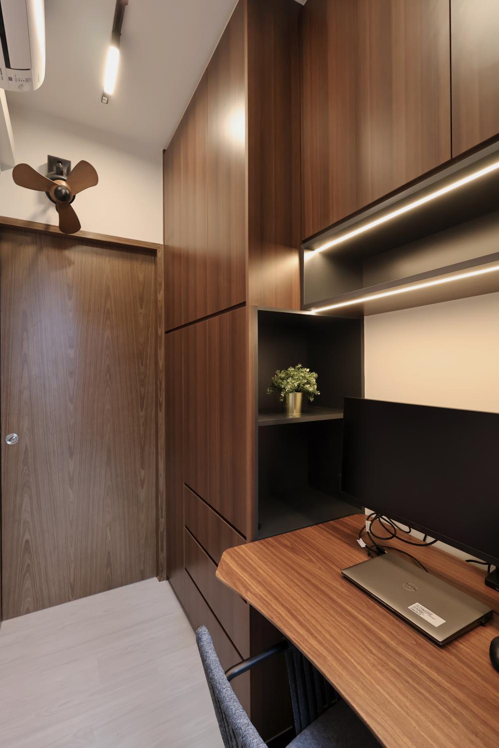 Modern Home Office with Bookshelf and Storage Cabinets