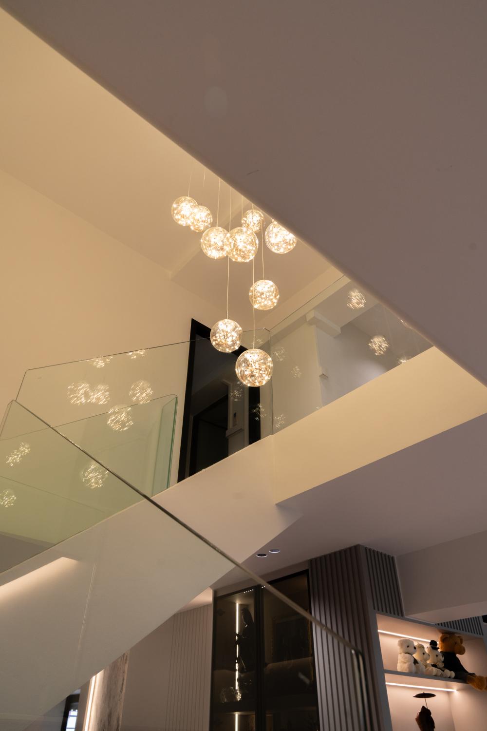 Contemporary Hallway with Bookshelf and Artwork