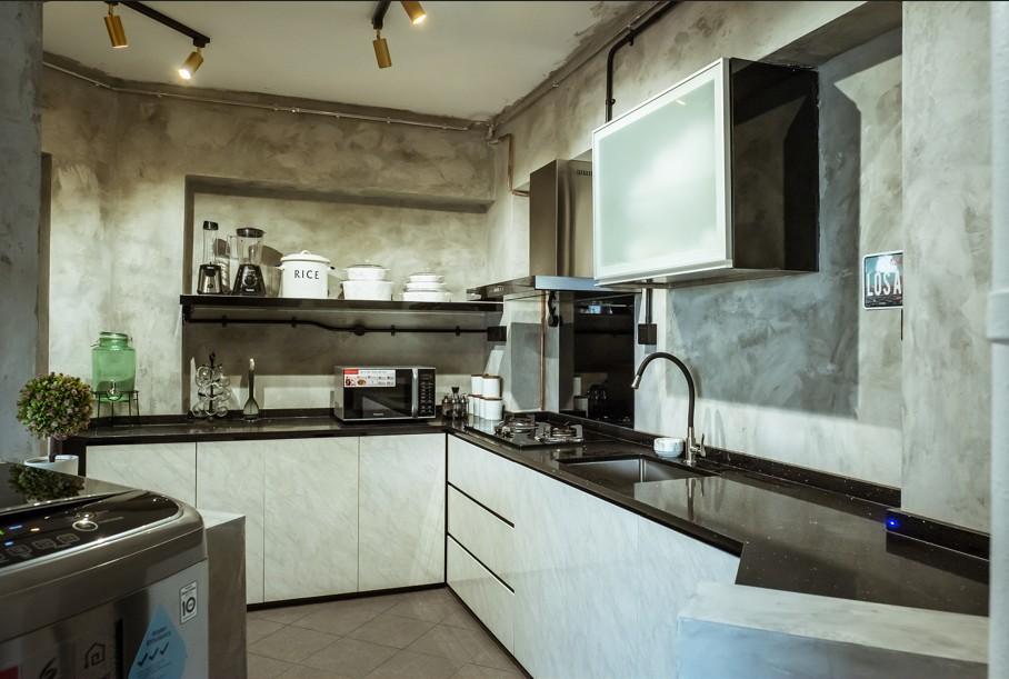 Industrial Kitchen with Countertop and Cupboard