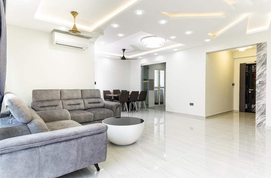 Asian Living Room with Homogeneous Tiles and Cove Lighting