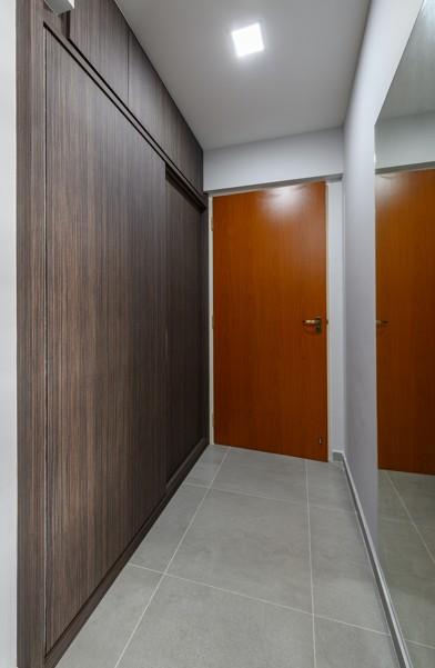 Modern Walk-in Wardrobe with Mirror and Artwork