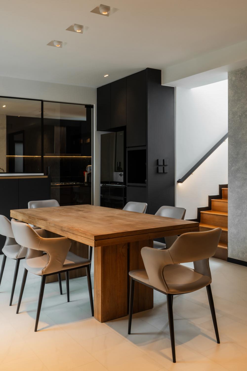 Contemporary Dining Room with Staircase and Dining Table